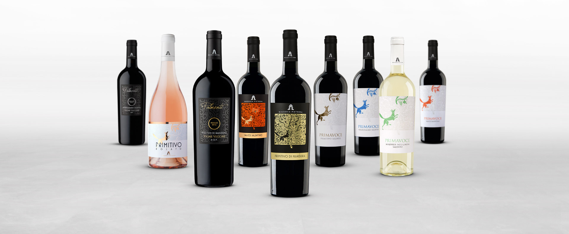 Wijnflessen van Pietrosa met centraal de primitivo